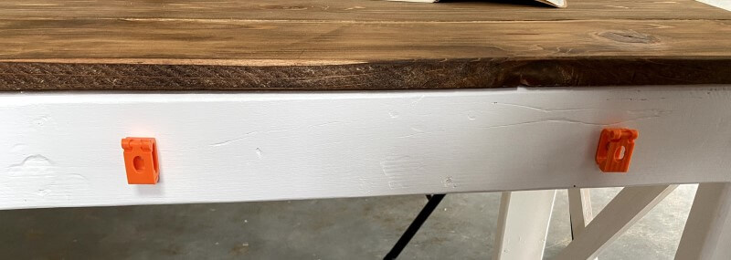 3D printed cable management clips on desk back